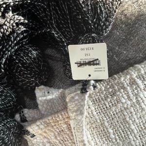 Anthropologie Textured pomp poms 
Throw Blanket
